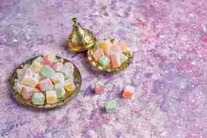 Free photo eastern sweets.turkish delight,lokum with nuts,top view.