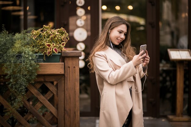 Eastern woman with phone