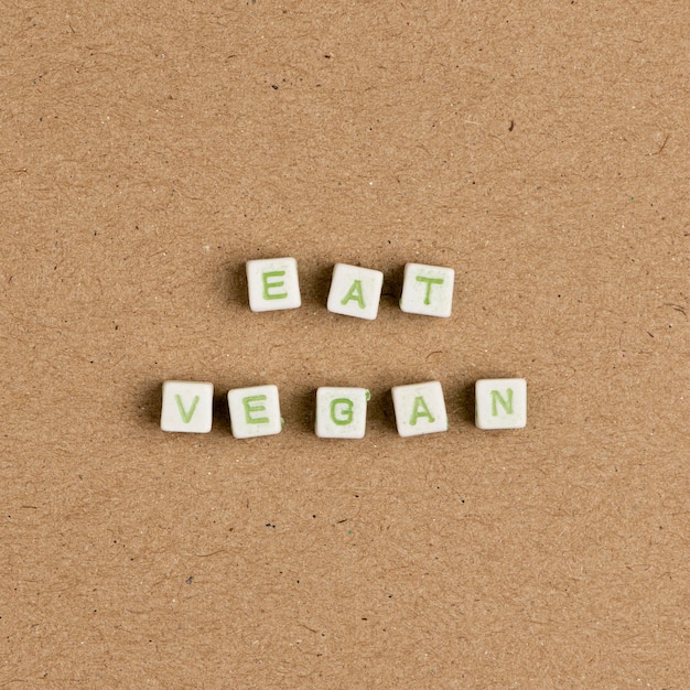 EAT VEGAN beads message typography