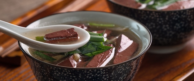 Premium Photo | Scooping stewed and braised minced pork for almost eating  with white cooked rice. taiwanese traditional cuisine food.