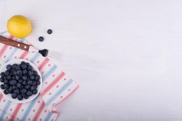 Free photo eating some blueberries