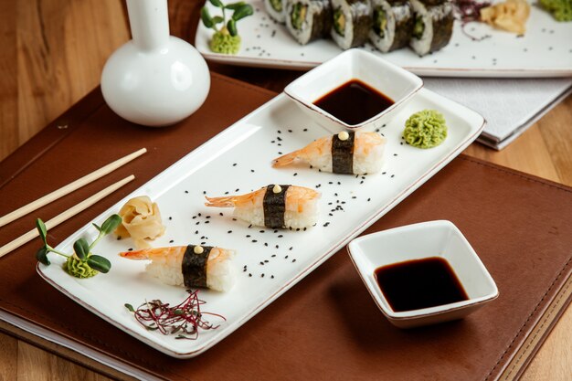 Free photo ebi nigiri with wasabi ginger and soy sauce