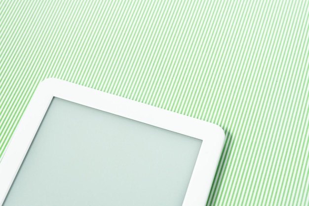 Free photo ebook reader over green striped background