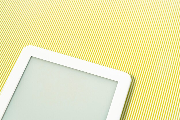 Free Photo ebook reader over green striped background
