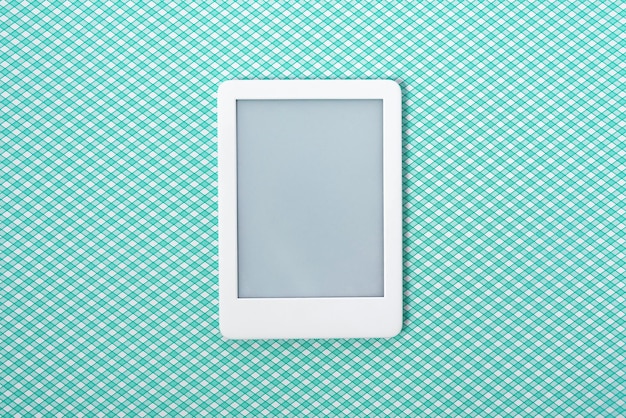 Free photo ebook reader over green striped background