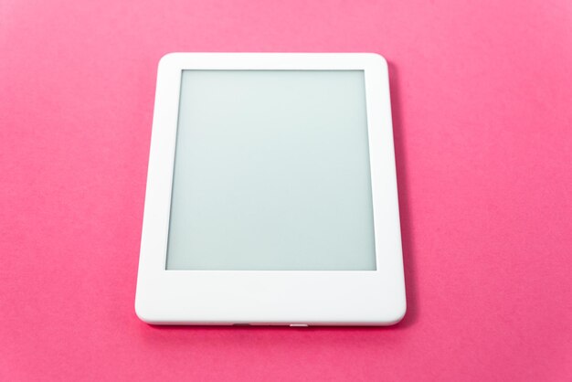 Ebook reader over pink background