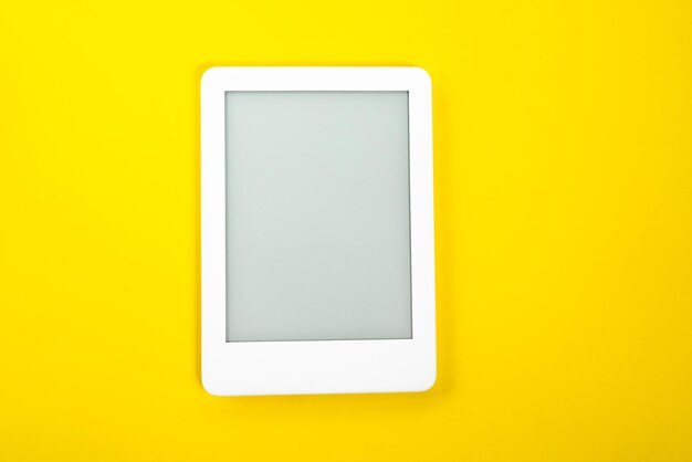 Ebook reader over yellow background