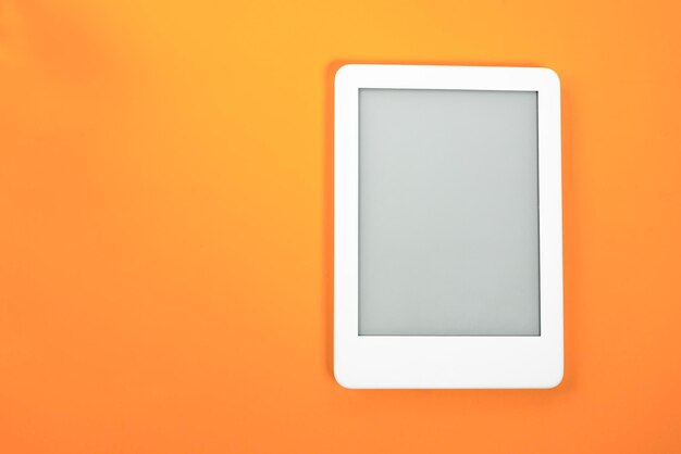 Ebook reader over yellow background