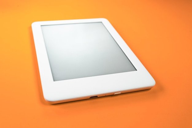 Free photo ebook reader over yellow background