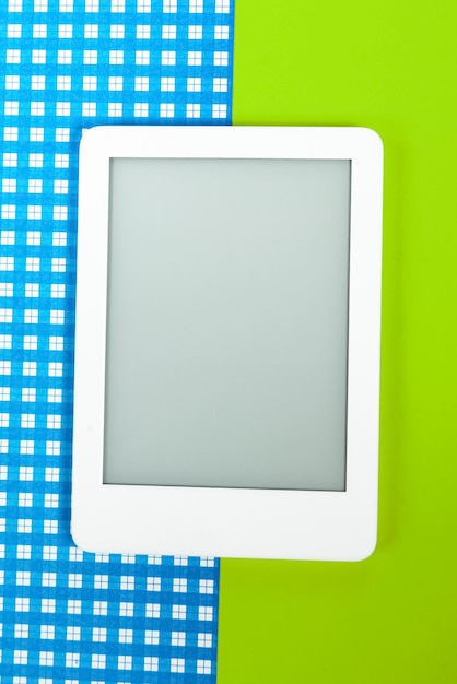 Free photo ebook reader over yellow and blue background