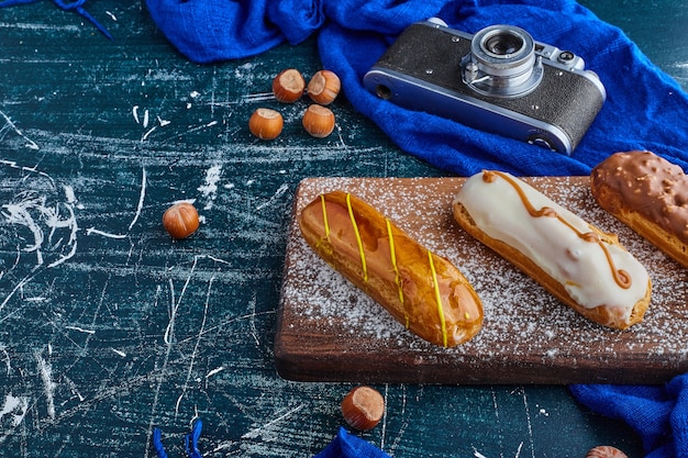 Eclairs with chocolate creams. 