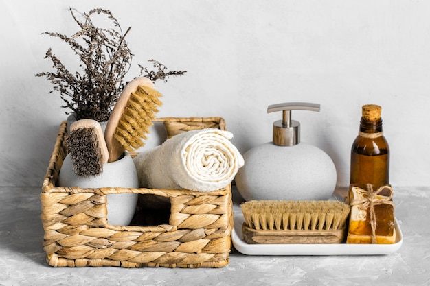 Eco-friendly cleaning products set in basket with soaps and brushes