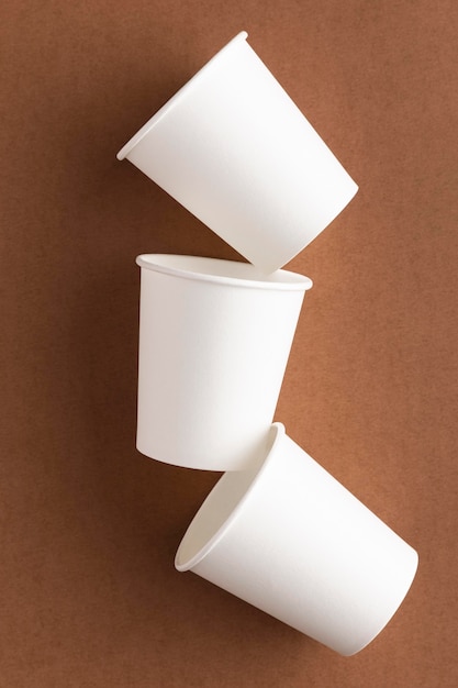 Eco-friendly cups flat lay