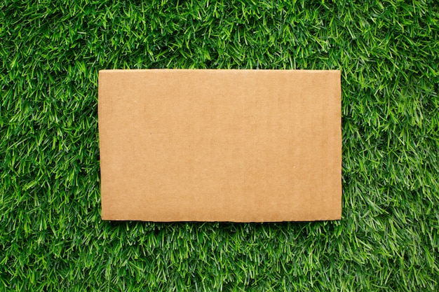 Ecological paper sheet on grass