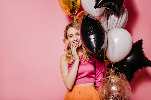 Ecstatic woman expressing happy emotions during party