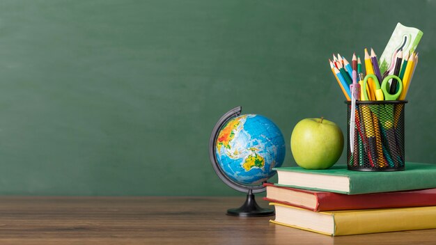 Education day arrangement on a table with copy space