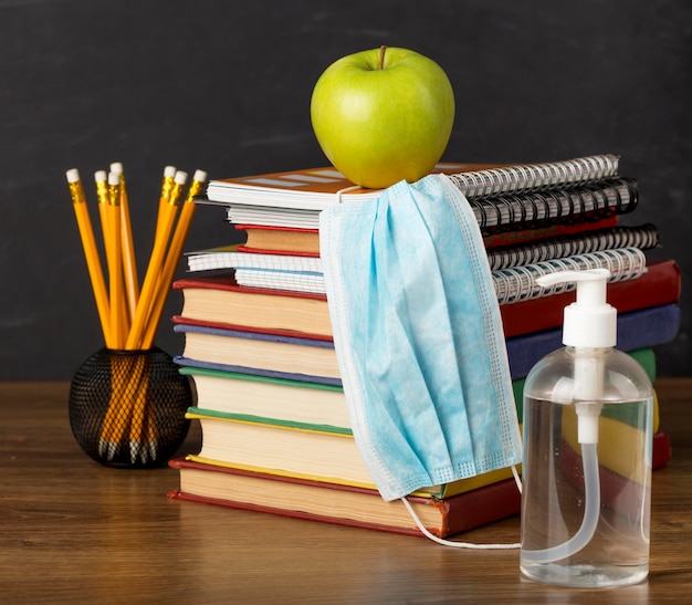 Education day arrangement on a table with medical mask