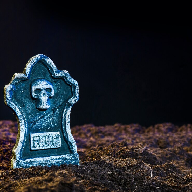 Free Photo eerie headstone on soil