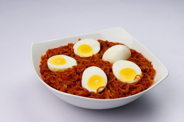 Premium Photo | Egg roast or indian egg masala curry spicy red egg