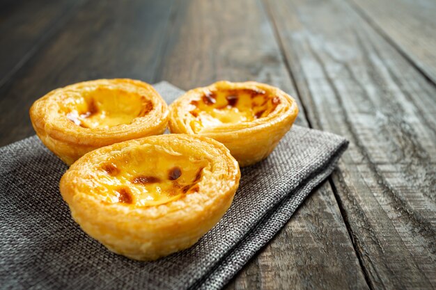 Egg tart on wood.