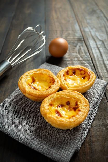 Egg tart on wood.