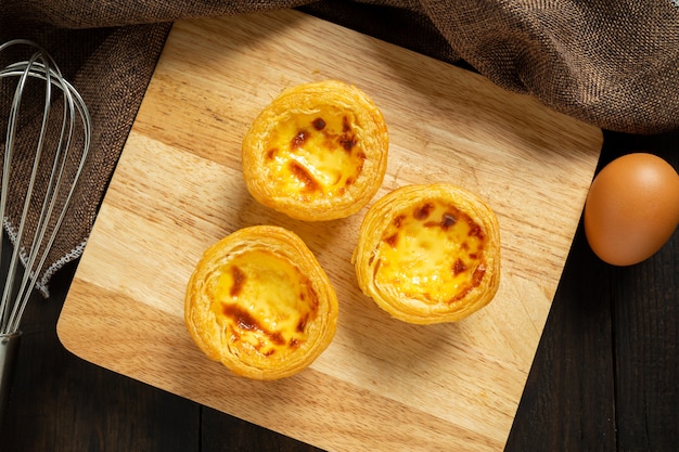 Egg tart on wood.