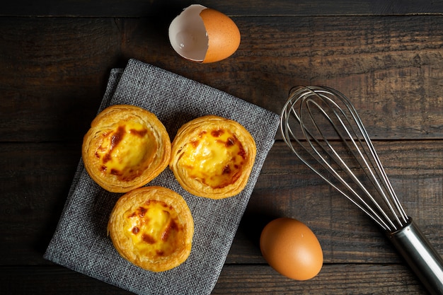 Egg tart on wood.