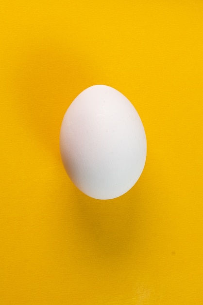 Egg on the yellow background