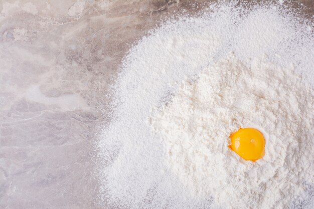 An egg yolk on the all purpose flour