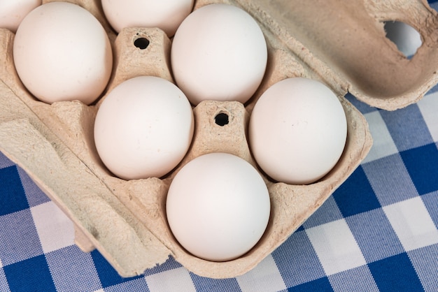 Eggs on the blue background