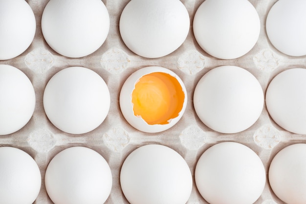 Eggs in formwork with one cracked