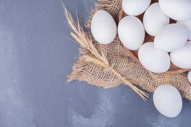 Eggs on a piece of rustic burlap.