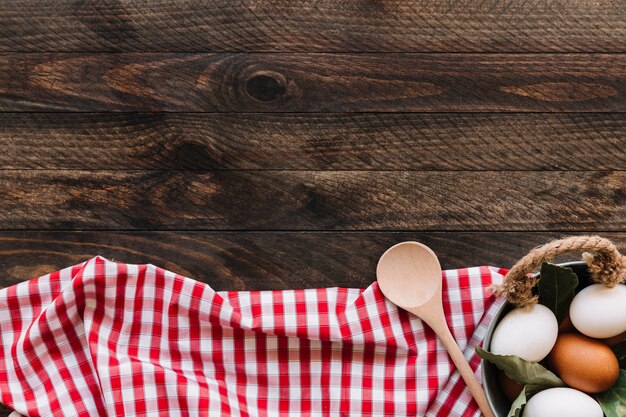 Eggs and spoon on napkin