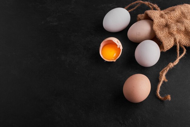 Eggs spread out of the rustic parcel. 