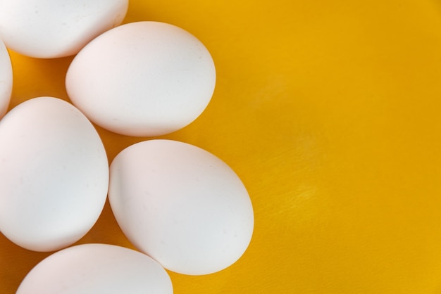 Eggs on the yellow background