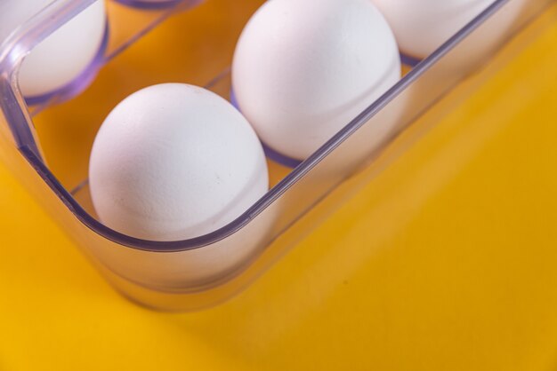 Eggs on the yellow background