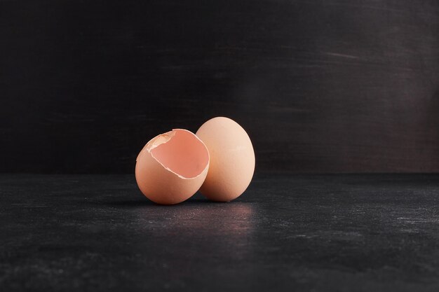 Eggshells isolated on black space. 