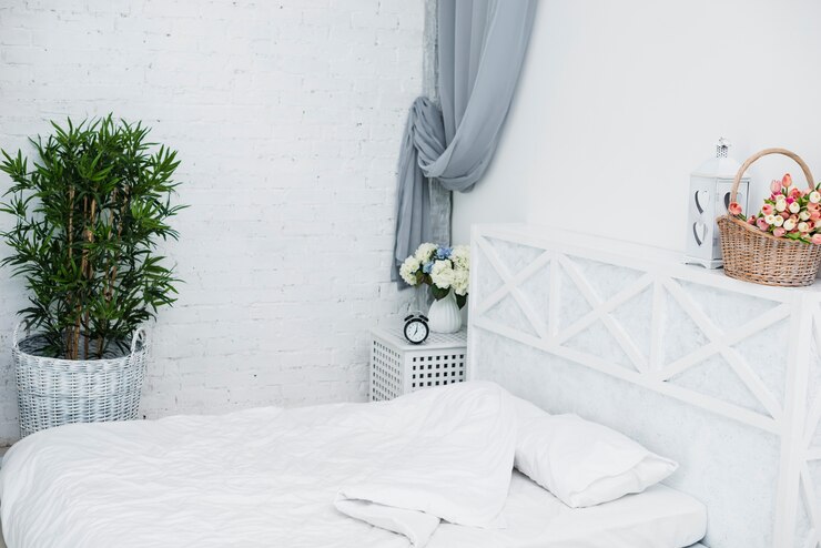 Free Photo elder couple  bed in white bedroom