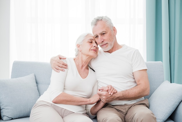 Elder couple being affectionate with each other