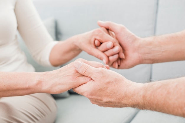 Free photo elder couple being affectionate with each other