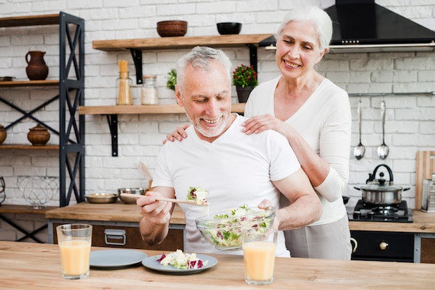 Elder couple cooking in the kitchen