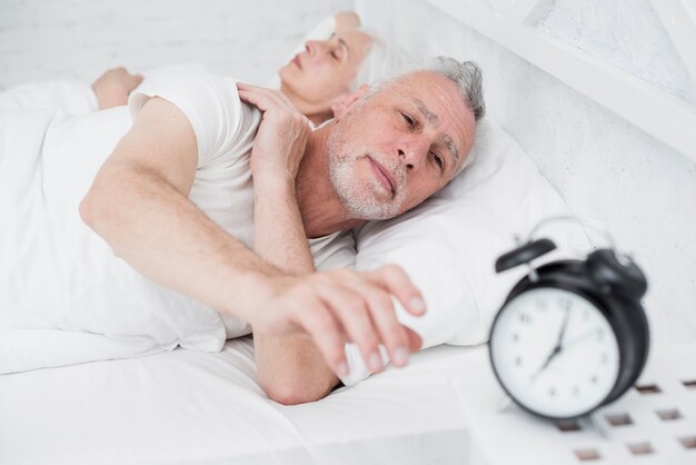 Elder couple resting in the bed