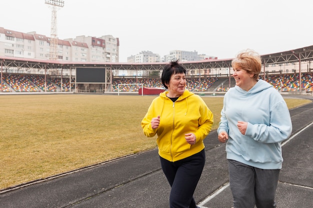 Elder females running at stadium