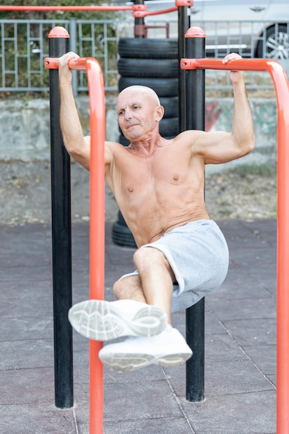 Elder man working out outdoors