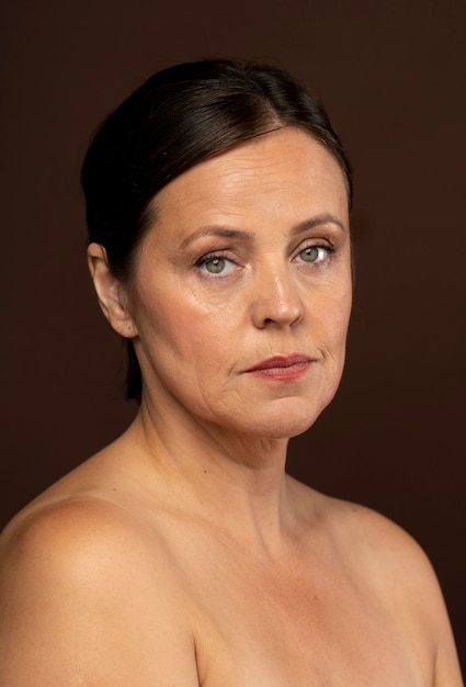 Elder woman posing for a beauty shot with make-up on