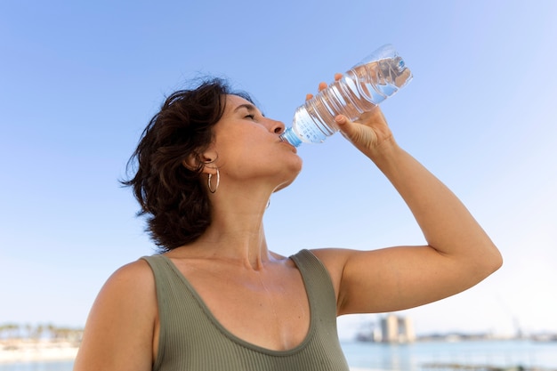 Elder woman struggling with high temperature