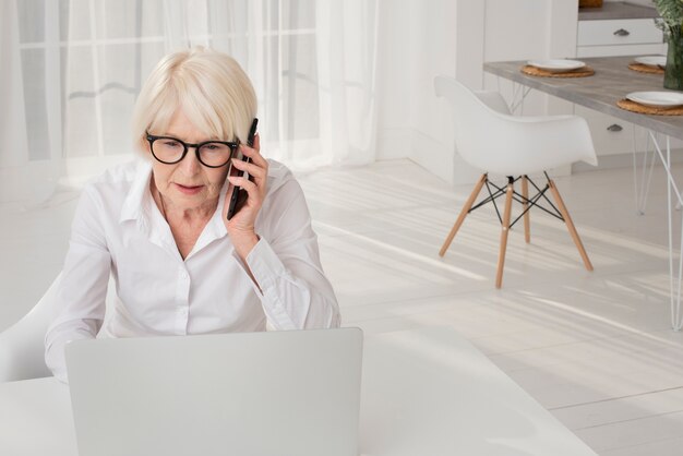 Elder woman talking on the phone