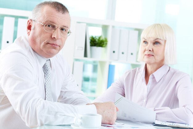 Elderly businessman in his office