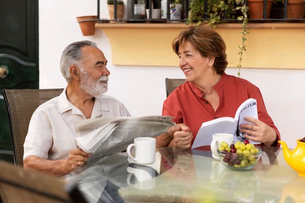 Elderly couple enjoying life at home in the countryside