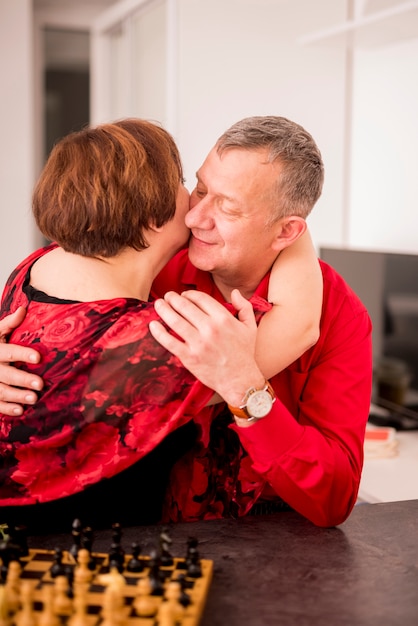 Free photo elderly couple hugging